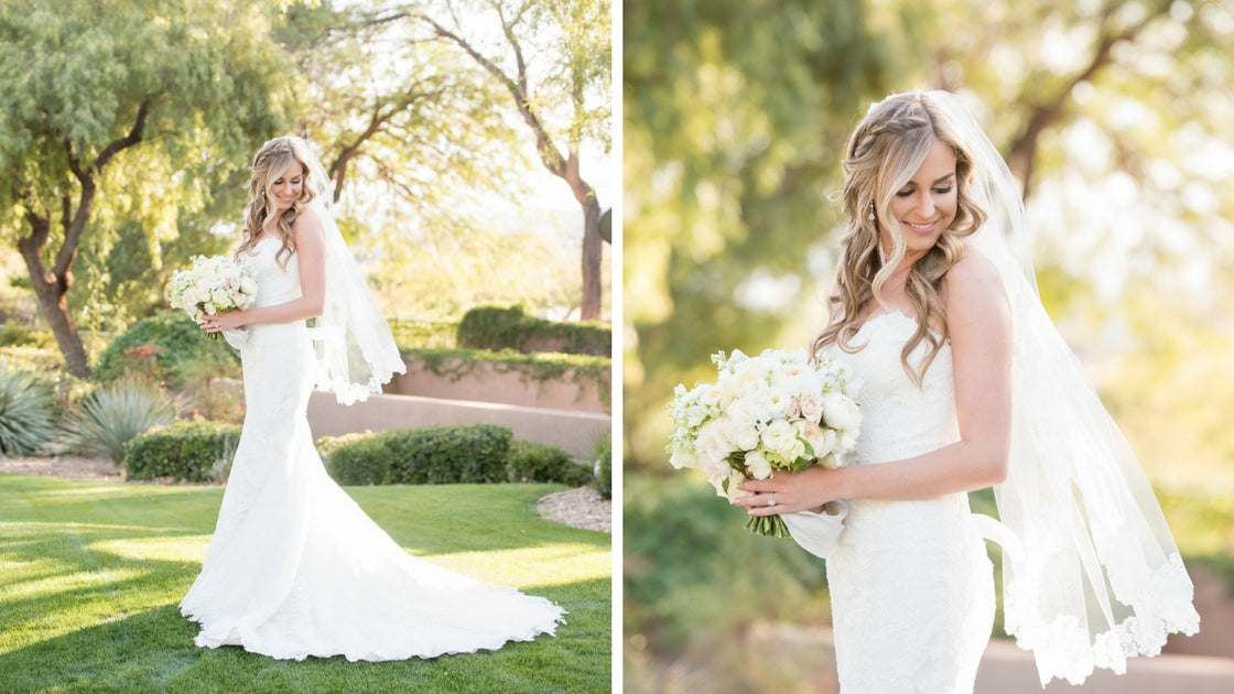 Bride poses in beautiful Las Vegas sunlight with happy smiles and beautiful white bloom bouquets. 