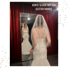 Stoere bruidsjurk et een korte sluier Betaalbare Bruidsmode Delft Naaldwijk Westland