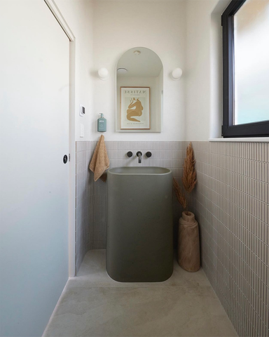 Molli freestanding cylinder in Olive displayed in a powder room from 2023 season of The Block.