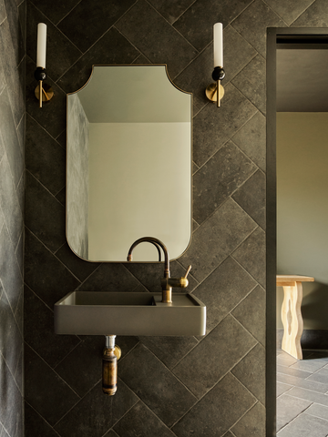 Taylor's Wines accessible bathroom designed by Architect Kristina Soggee featuring Shelf 02 basin in Mid Tone grey with aged brass tapware and grey stone tiles.