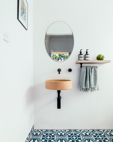 Wall Hung Bowl Basin in Pastel Peach by Davine Bathrooms and RJ Studio.