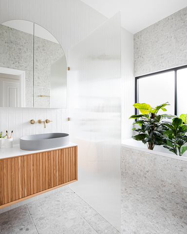 Photograph showcasing the main bathroom renovation by Georgia Neale for M.J. Harris Group, featuring the Nood Co Pill Basin in Sky Grey, photographed by J-HAZ. This image highlights the modern, sophisticated design of the bathroom, focusing on the sleek Pill Basin set against a backdrop of tasteful decor and contemporary finishes, reflecting a perfect blend of functionality and style.