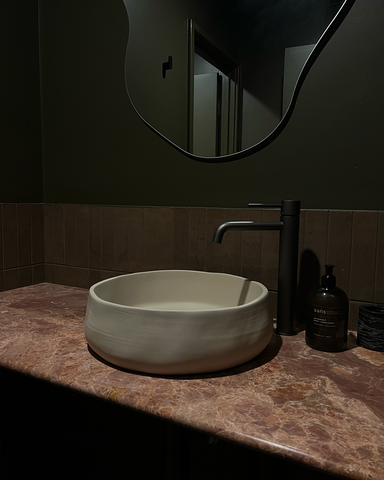 Detail shot of the Conscious Mill Basin in Nood, highlighting its organic texture and elegant design