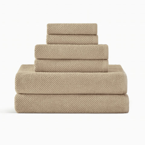 https://cdn.shopify.com/s/files/1/0557/8840/4900/products/textured-organic-cotton-bath-towels-light-taupe-set_large.jpg?v=1684875511