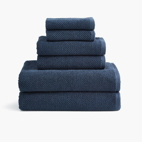 https://cdn.shopify.com/s/files/1/0557/8840/4900/products/textured-organic-cotton-bath-towels-navy-blue-set_large.jpg?v=1684874434