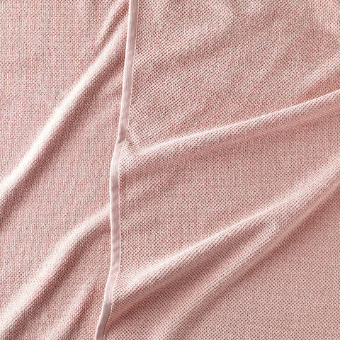 https://cdn.shopify.com/s/files/1/0557/8840/4900/products/textured-organic-cotton-bath-towels-pink-detail_large.jpg?v=1687377231