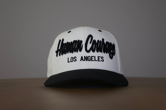 Human Courage Snap Back Hat/ Green under Brim