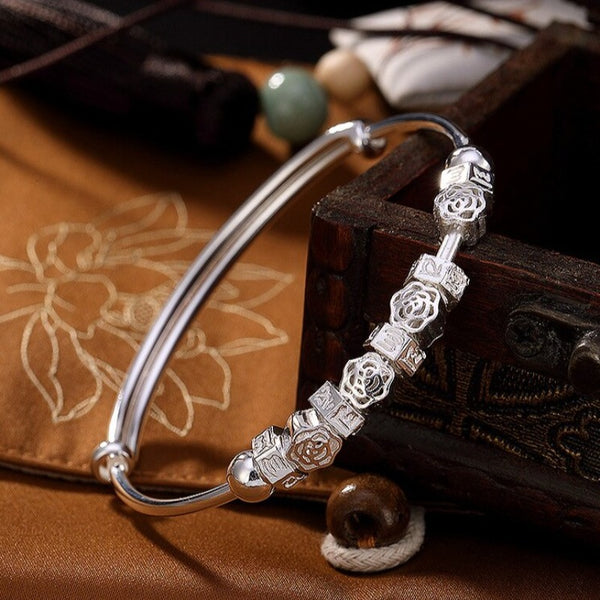 Kanona-bracelet-jonc-ferme-ajustable-argent-massif-advec-charms-pour-femme-perles-roses-vue-profil