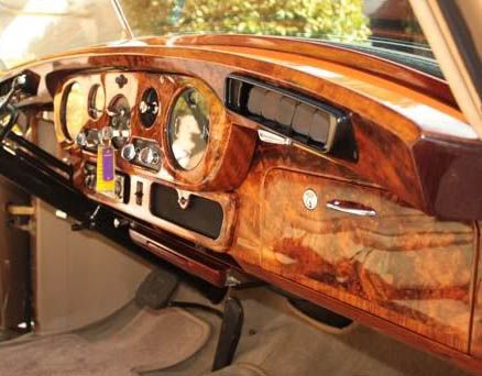 Walnut wood veneer car dashboard