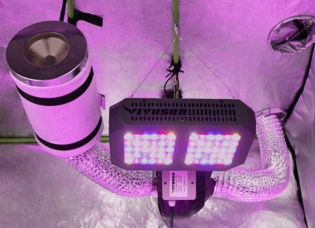 This carbon filter is connected to insulated ducting that leads to a high output fan over a LED grow light.