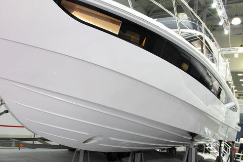 White fiberglass boat with high quality gel coat finish.