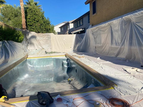 Backyard pool ready to be refinished with gel coat.