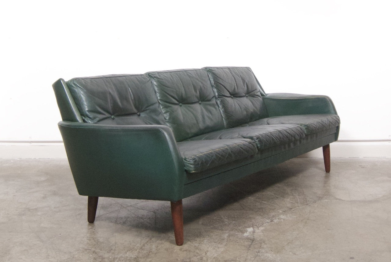 dark green leather sofa