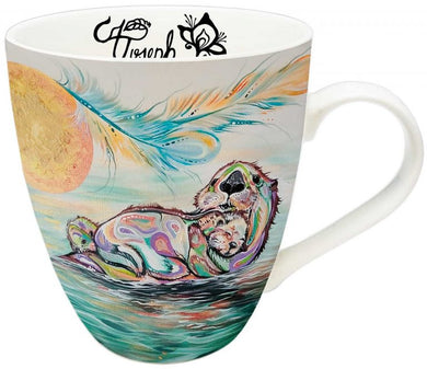 a mug with Indigenous design of an otter with a baby otter floating in water 