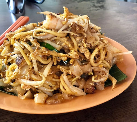 Char kway teow with prawns, beansprouts, chives, eggs, and yellow noodles. Photo by James Teh.