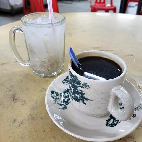 Kopi-O on the right, iced barley on the left. Photo by Zi Jie Lim.