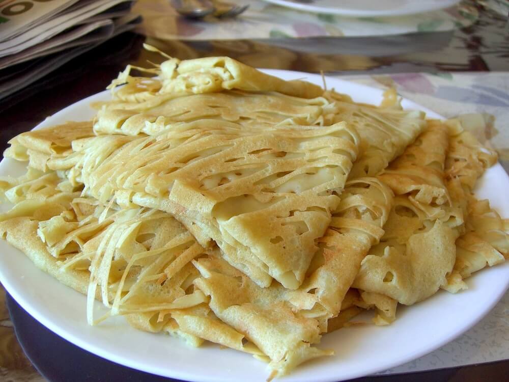 Roti Jala crepe form. Photo by Alpha from Flickr.