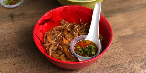 Silver needle noodle cooked in dark soy sauce. Photo by Darren N.