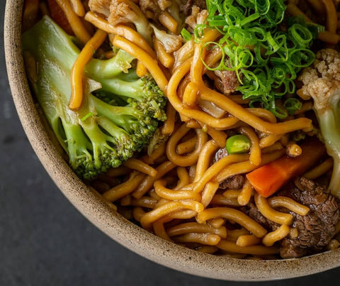 Yellow noodles used in a noodle stir fry. Photo by Leonardo Luz.