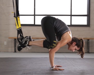 women doing crow pose