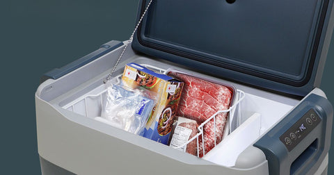 Closeup picture of a SmartKool 12V cooler open and filled with frozen foods