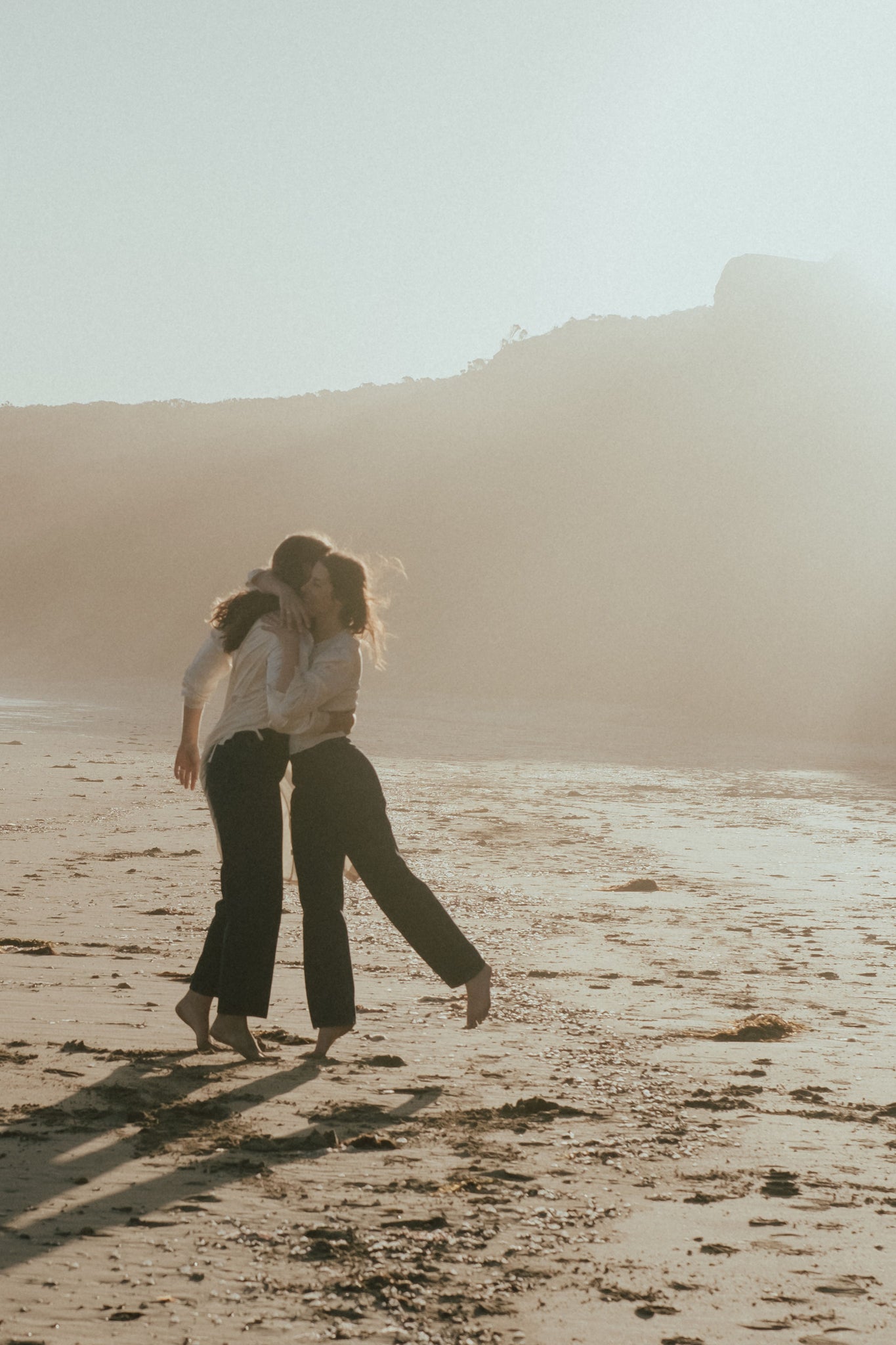 dancing on the beach in Australia in HERA Denim jeans