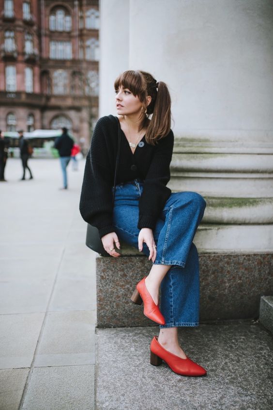 High waisted jeans with tucked in cardigan