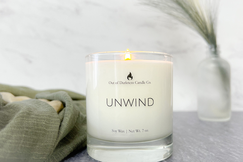 unwind with this lavender and citrus scented candle that promotes mental wellness