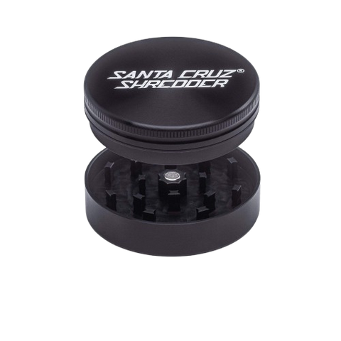 Santa Cruz Shredder black aluminum grinder, featuring precision-engineered teeth for consistent herb grinding. Known for durability and performance among cannabis enthusiasts.