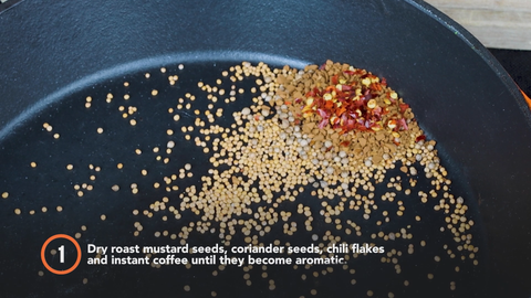 Step 1: Dry roast mustard seeds, coriander seeds, chili flakes and instant coffee until they become aromatic.