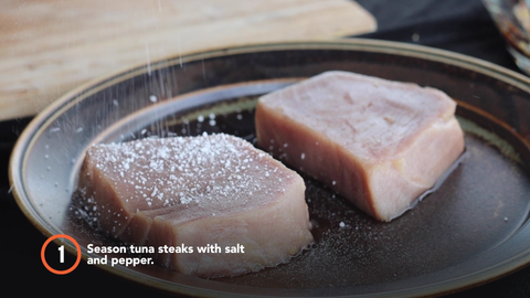 Step 1: Season tuna steaks with salt and pepper.