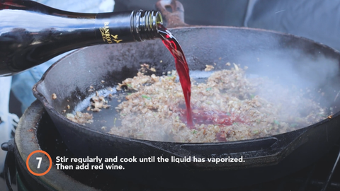 Step 7: Stir regularly and cook until all liquid has vaporized. Then add red wine.