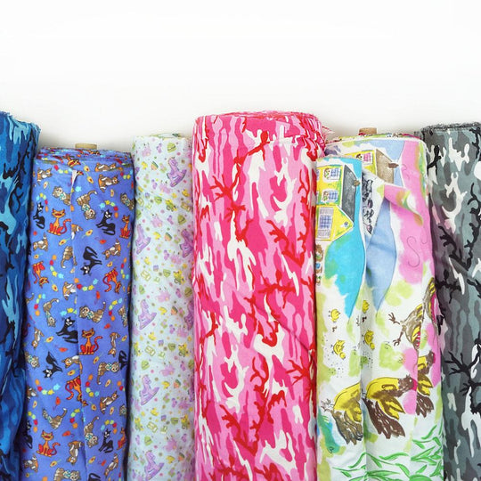 Wholesale Fabric: Cotton Flannel Cartoon Dogs Light Blue » Fabric Merchants  Wholesale Fabric