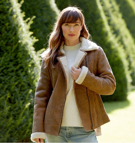 Woman wearing the Ella Women's Vintage Antique Sheepskin Flying Jacket in Brown