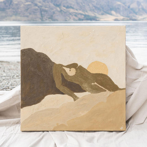 Original painting by Jade Barclay. Warm colour palette showing a woman laying over a mountain with her hip in the ocean.