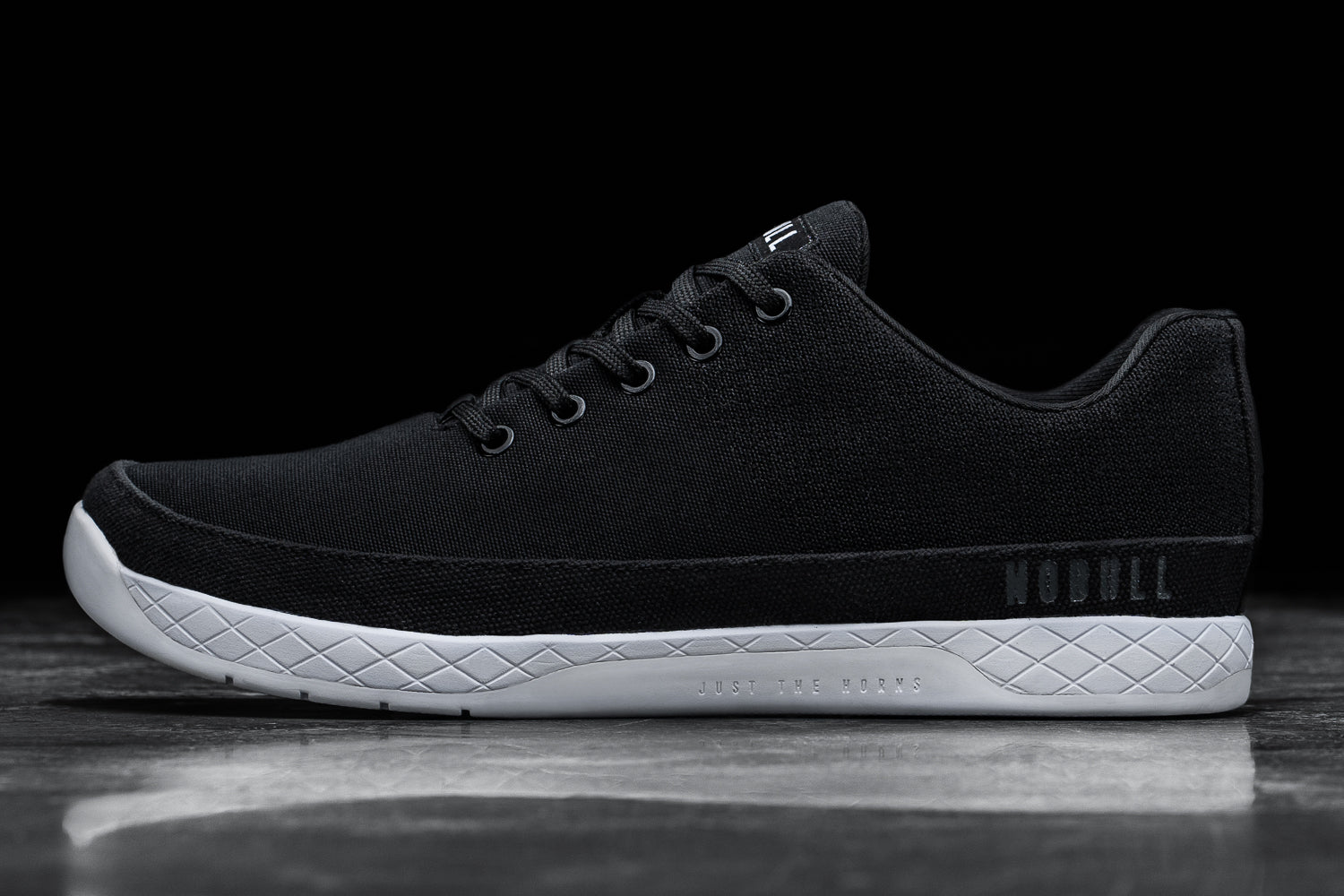 black canvas trainers womens