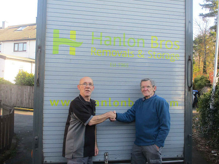 Paul Hanlon with a happy house removal customer.