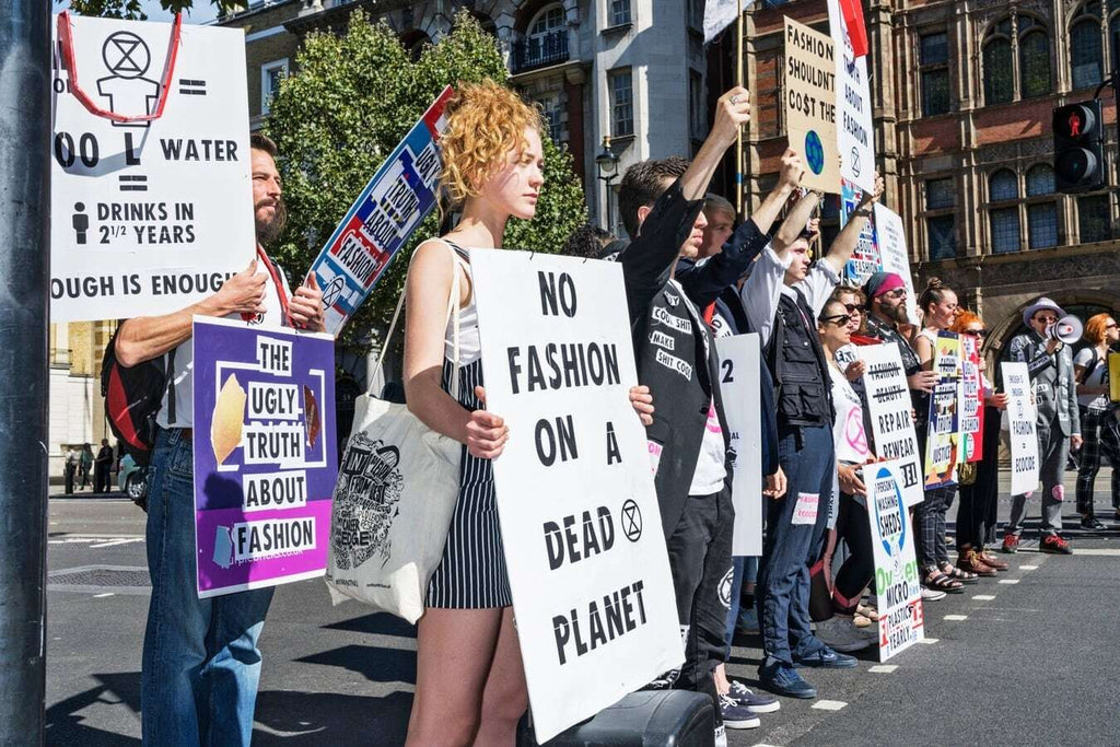 Fashion activists protesting