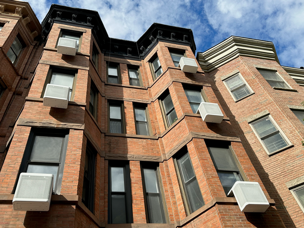 Gradient window heat pumps in a multifamily home