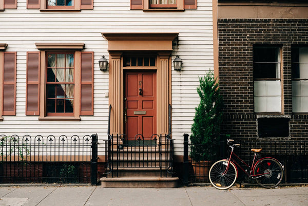 A bike in front of a house