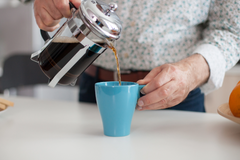 pouring coffee from a french press