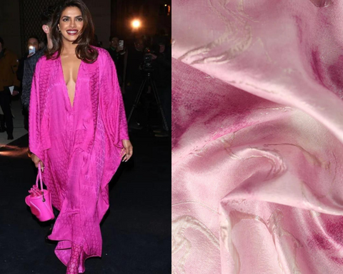 Priyanka Chopra wore a deep-slit V-neck dress in Pink PP for the Valentino show