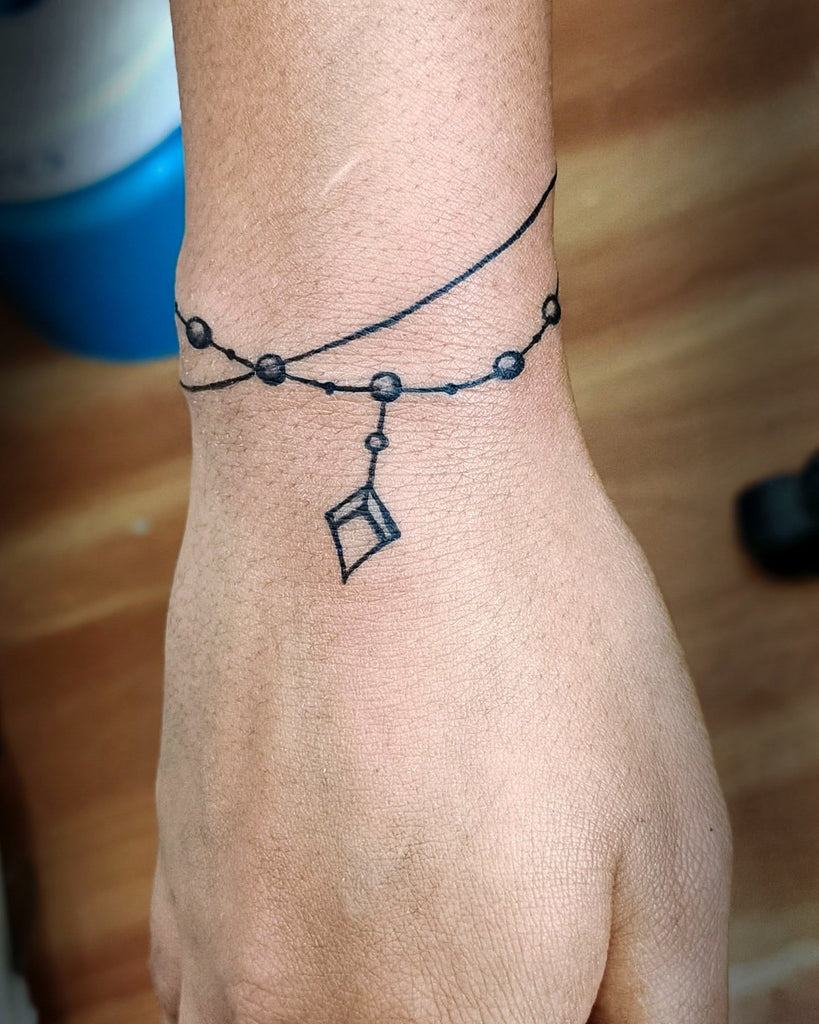 Black bracelet tattoo by Nudy tattooer - Tattoogrid.net