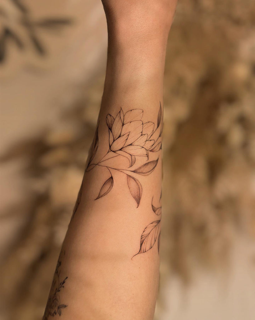 Floral anklet tattoo | Wrap around wrist tattoos, Wrap around ankle tattoos,  Wrap around tattoo