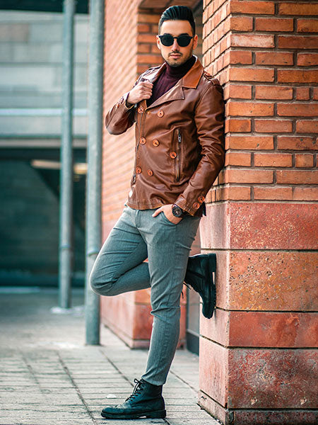 Men-brown-leather-jacket-with-turtle-neck-sweater-and-faded-jeans