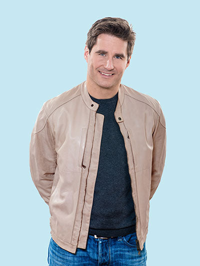 men in beige leather jacket paired with a darker shirt