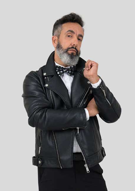 mens black biker leather jacket with black trousers, white dress shirt and bowtie