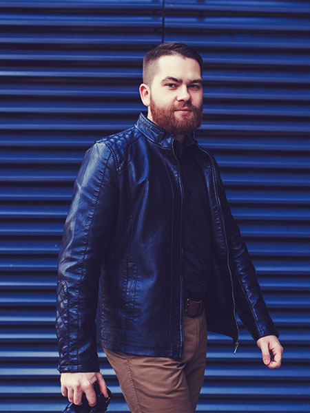 men-blue-leather-jacket-with-khaki-pants-and-dark-shirt