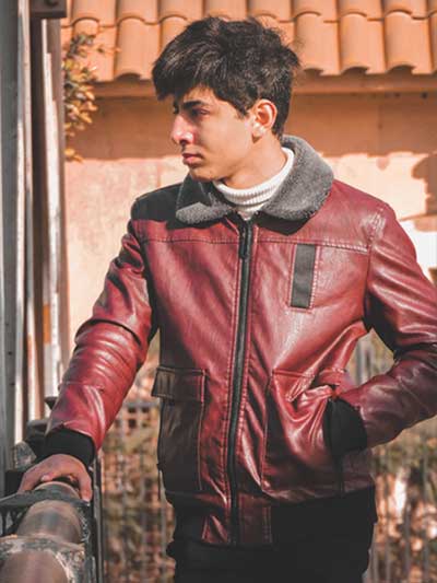men-burgundy-leather-jacket-with-black-pants-and-white-turtle-neck