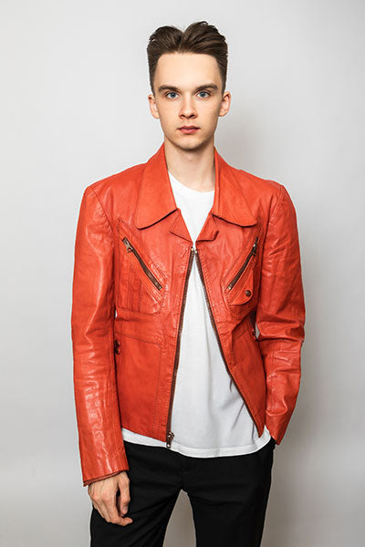 men-orange-leather-jacket-with-white-top-and-black-jeans